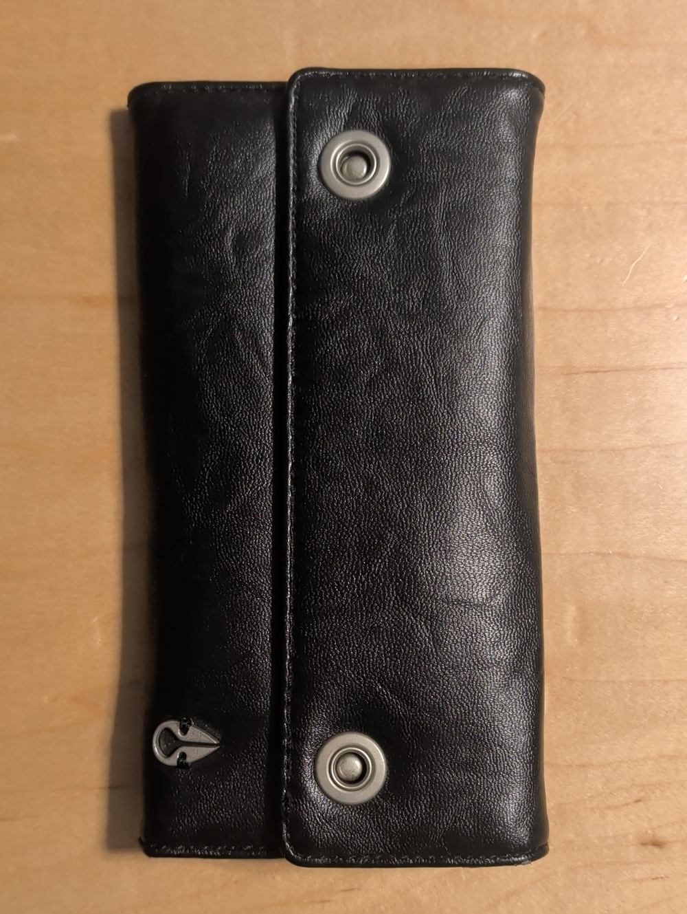 Nixon Black Leather Wallet with Snap Closures